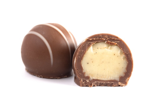 Milk Chocolate Truffles Filled with Vanilla Isolated on a White Backgroun