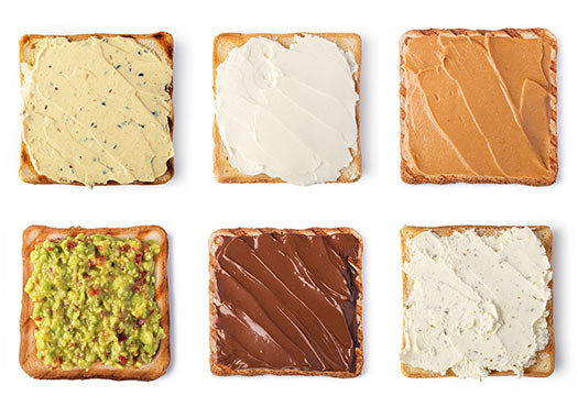 Toast with various spreads of healthy, unsaturated fatty acids