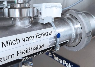  Image of a clip-on sensor for fouling monitoring on a pipe in a heat exchanger for dairy products