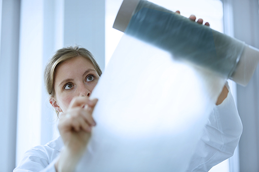 Laboranting carries out a quality check on a recycled film