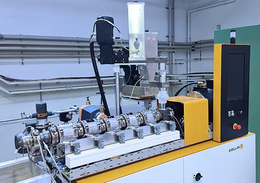 View of co-rotating twin-screw extruder