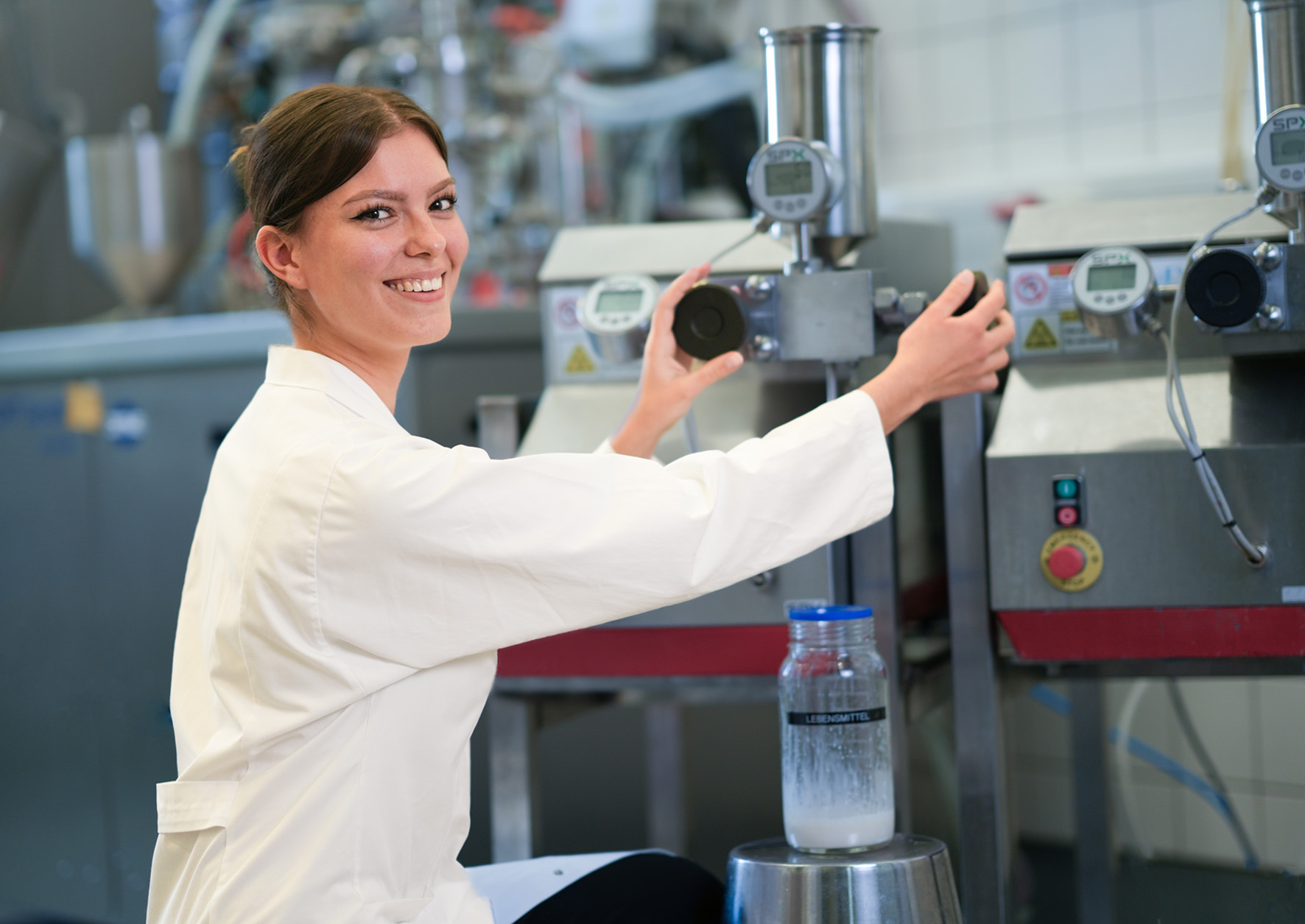 Nutrition of the future - Development of milk alternatives Employee in front of the plant developing milk alternatives