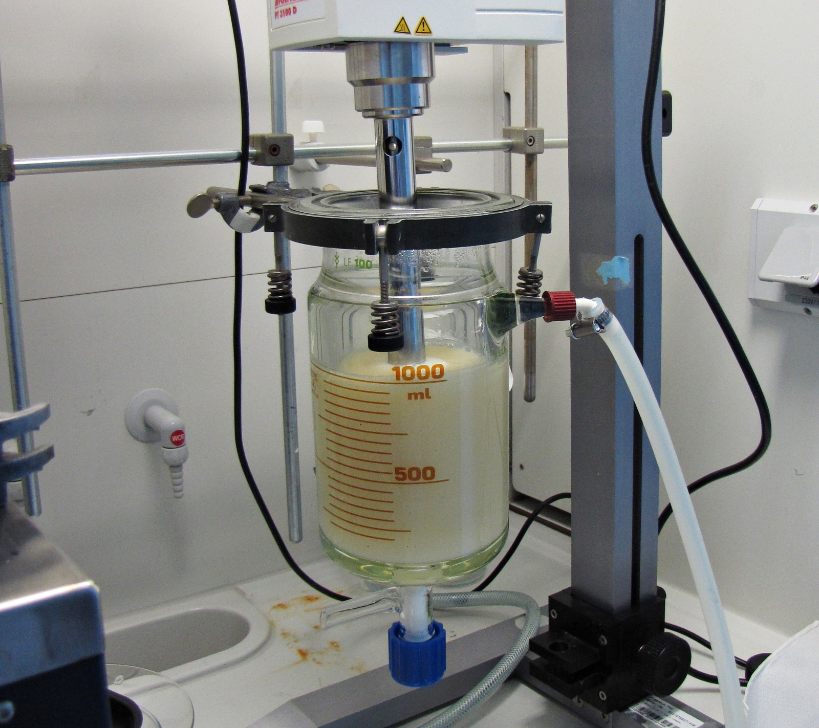 Machine that shows the mixing of wachs, proteines and additives for producing aqueous coating dispersion