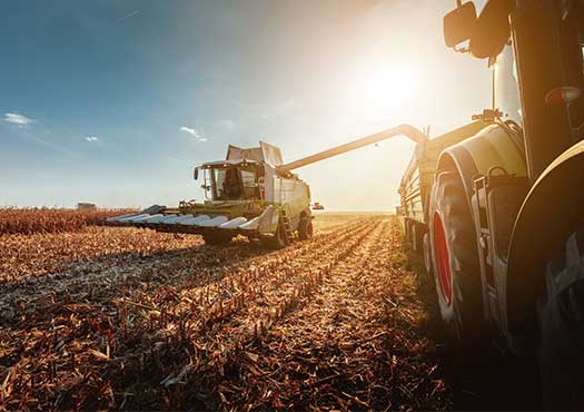Data and model-based algorithms in product efficacy agriculture, tractors in the field.
